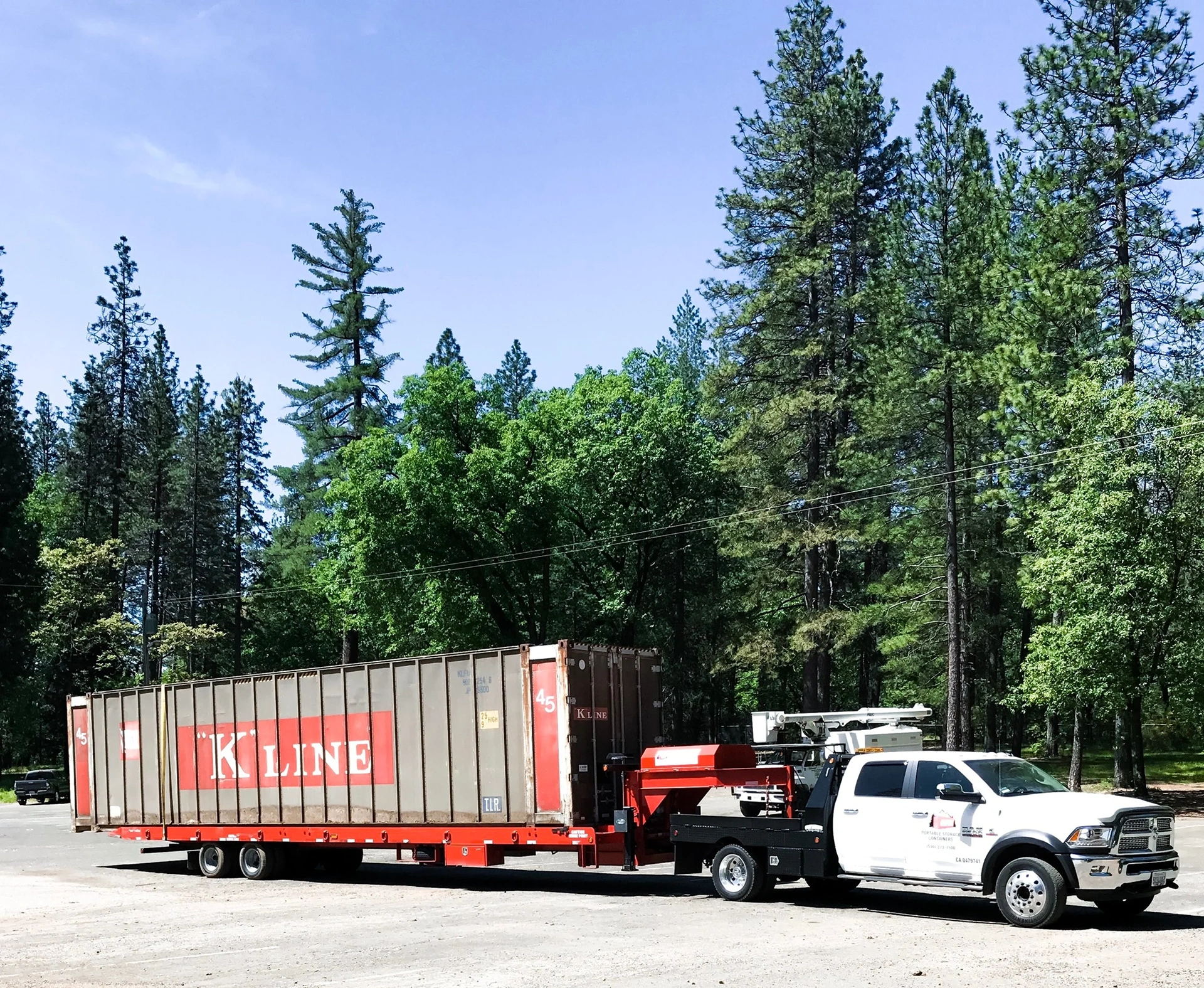 Vehicle transporting K Line container in nature